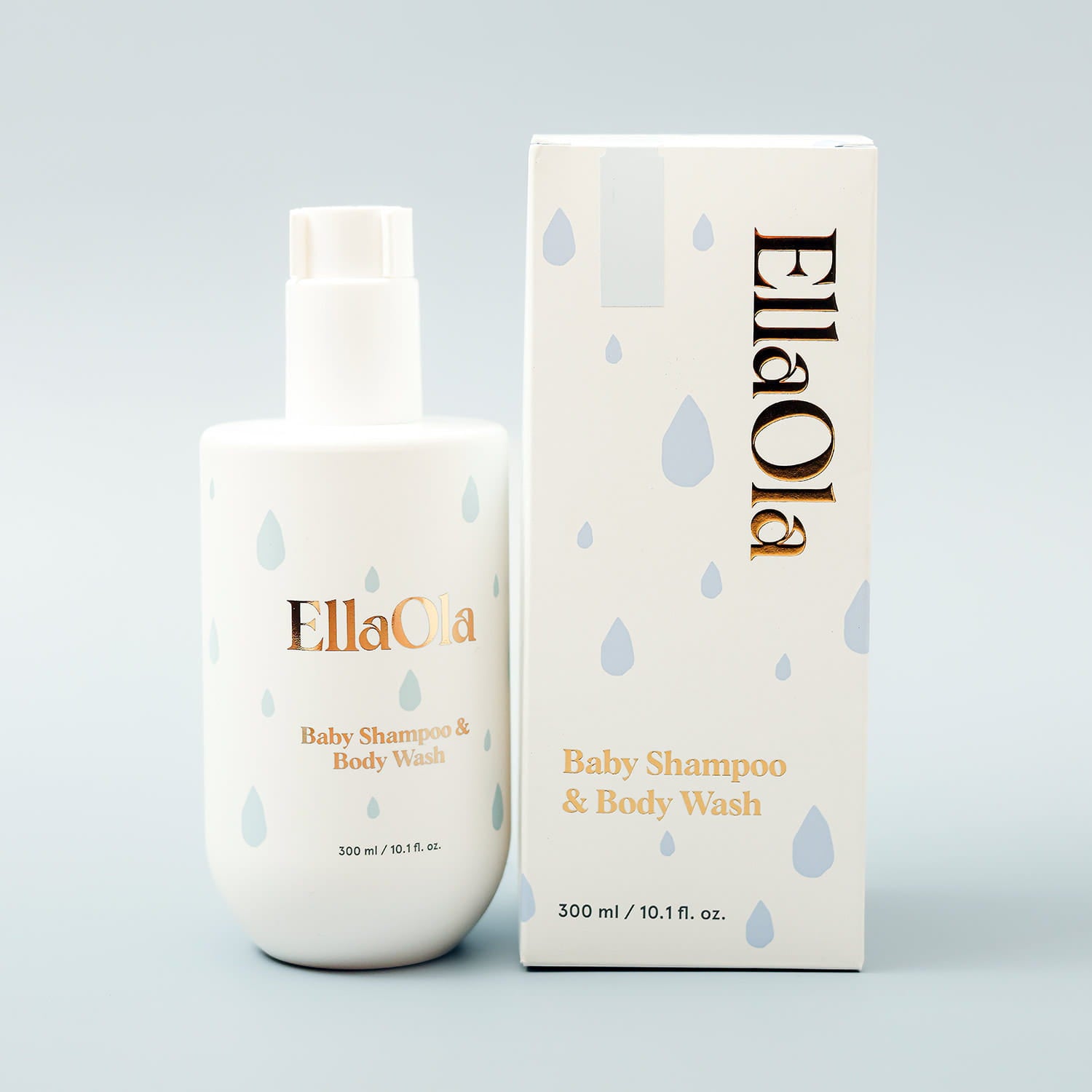 EllaOla baby shampoo and body wash bottle and packaging on a light gray background
