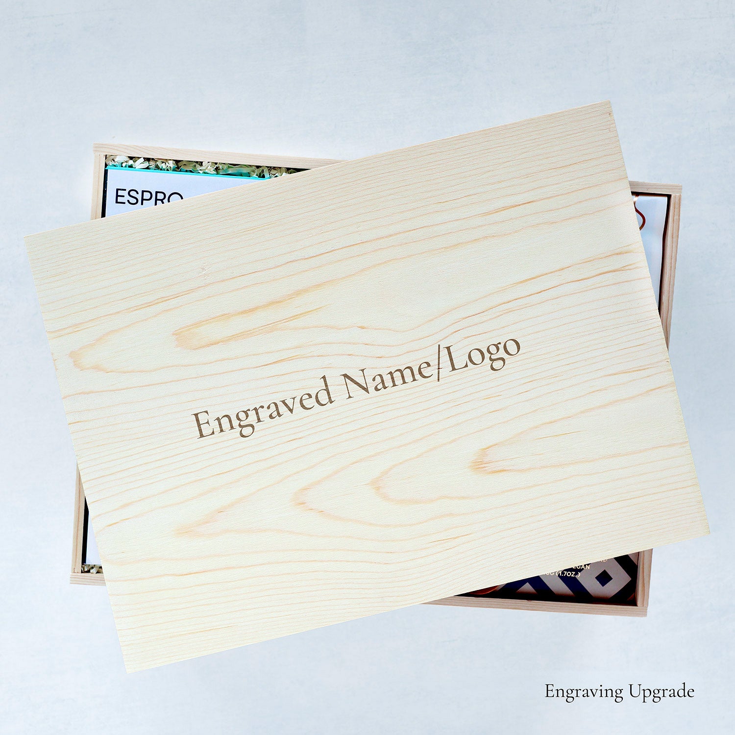 Wooden box with 'Engraved Name/Logo' text on a light gray background