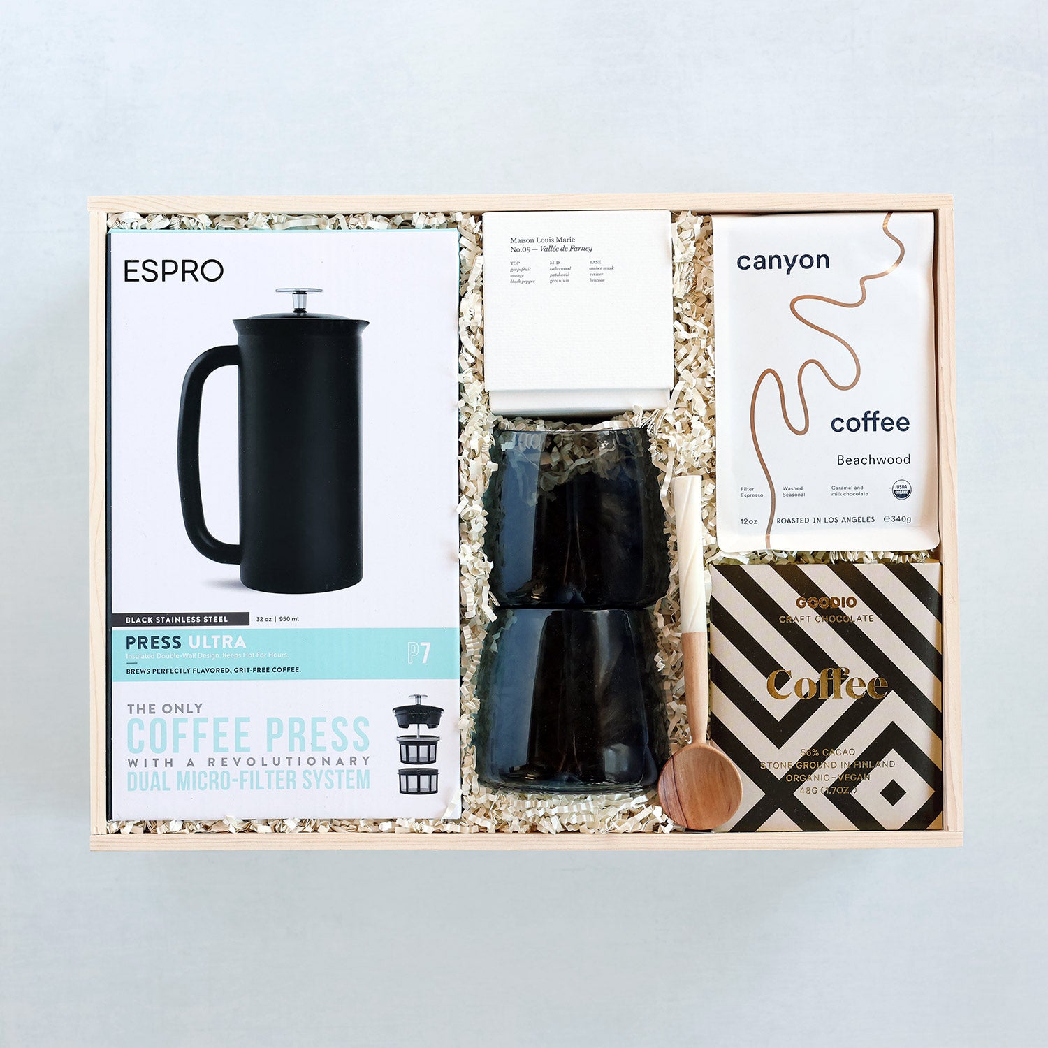 Espro coffee press set in a gift box with canyon coffee beans, mugs, spoon and candle.
